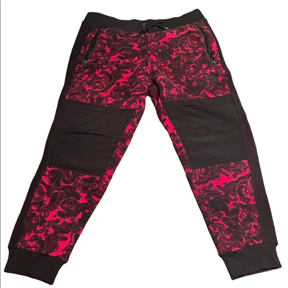The North Face 94 Rage Fleece Pant in rose red rage print sweatpants